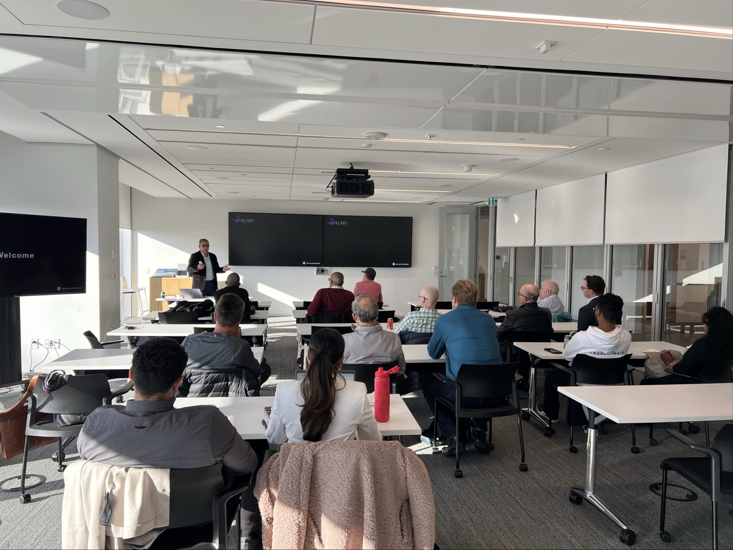 Alary Technologies event at Apple Canada Headquarters discussing business security and Apple ecosystem solutions.